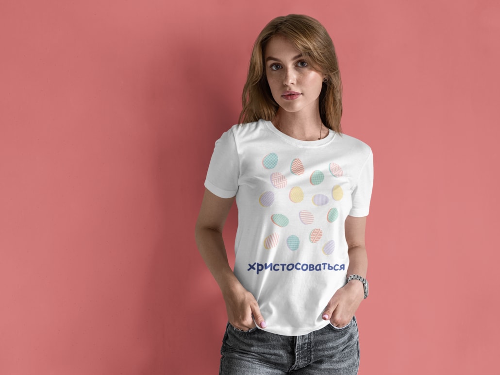 long haired woman posing with her hands in her pockets